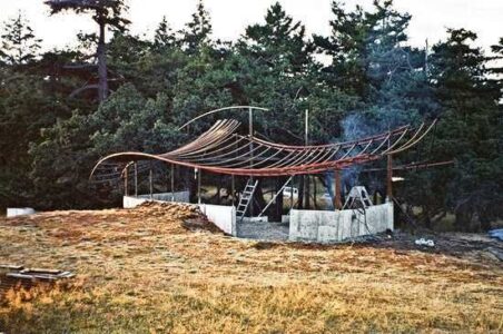 Boat Builder Constructs Sailboat-Inspired Handmade Home Image